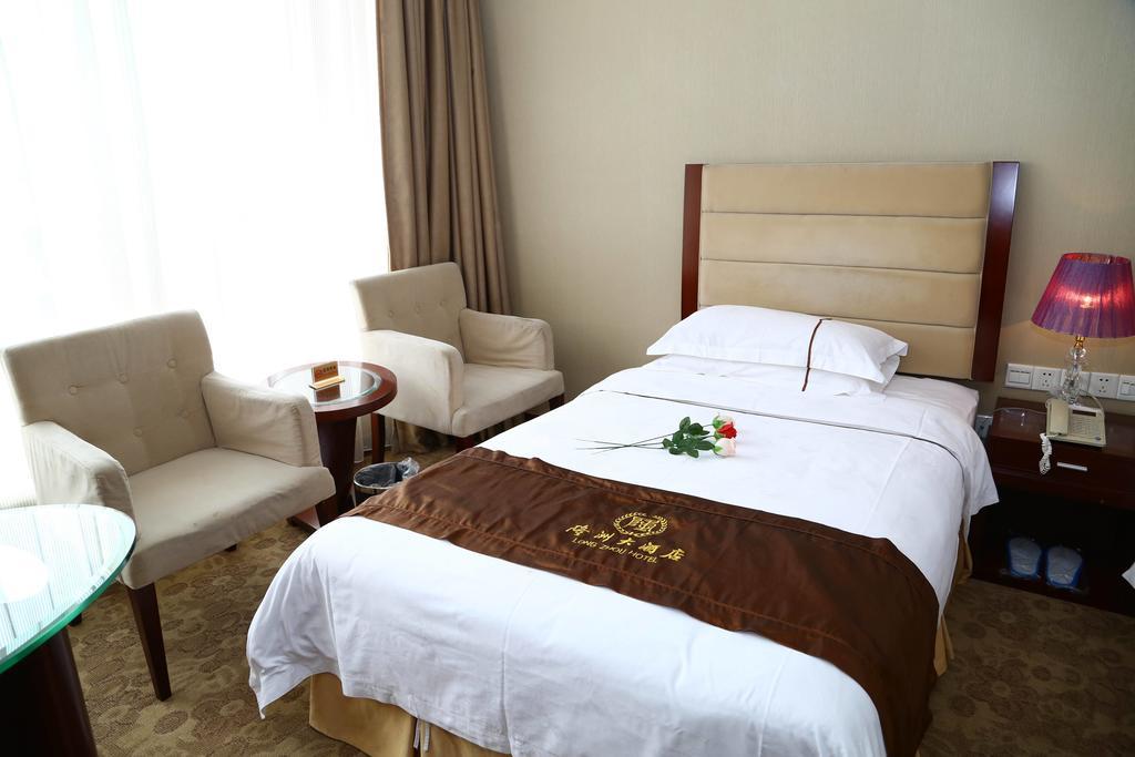 Long Zhou Grand Hotel Гуанчжоу Номер фото