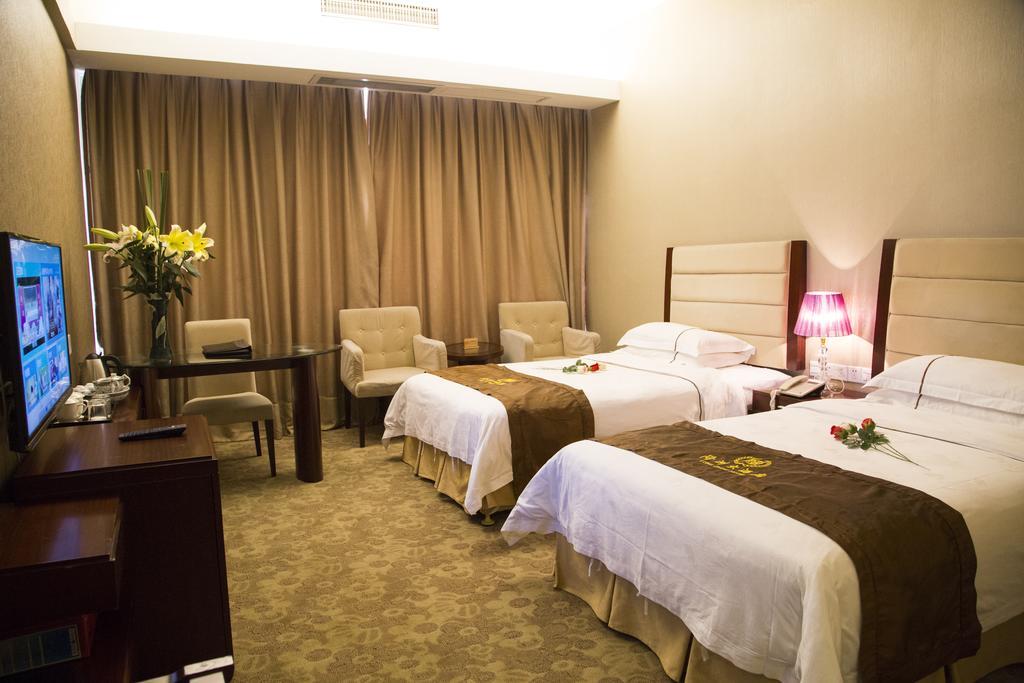 Long Zhou Grand Hotel Гуанчжоу Номер фото