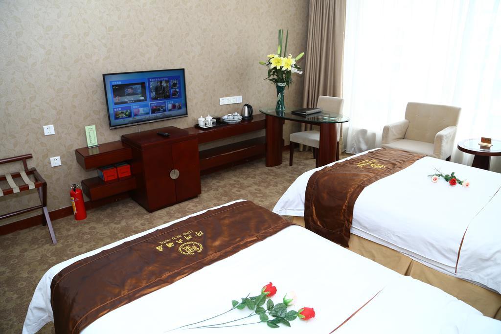 Long Zhou Grand Hotel Гуанчжоу Номер фото